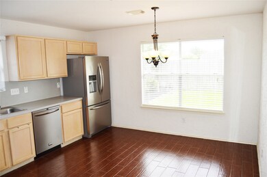 Beatiful kitchen which leads to the outdoor patio. Refrigerator is 1 years old and is included.
