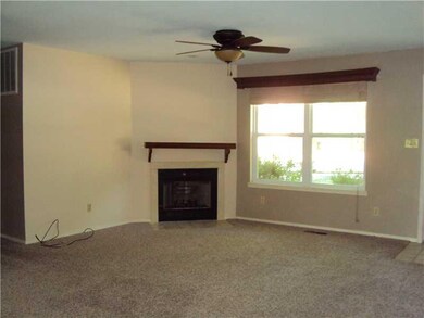 Living Room. Fireplace with gas burning logs.