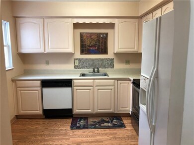 Looking into the kitchen from dining room
