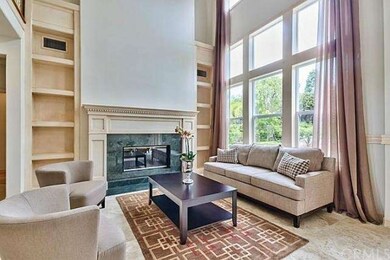 Formal Living Room w/Fireplace and Built ins