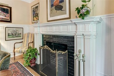 Gas fireplace with beautiful millwork.