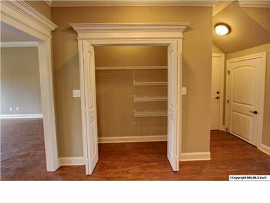 This plan has three pantries - one in the kitchen, one across from the kitchen and one under the stairs - storage, storage, and more storage.