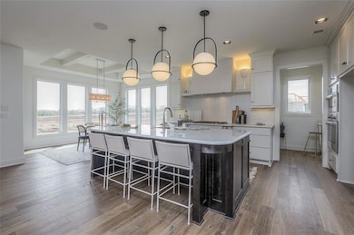 Photo is of a PREVIOUS MODEL, not the actual home.