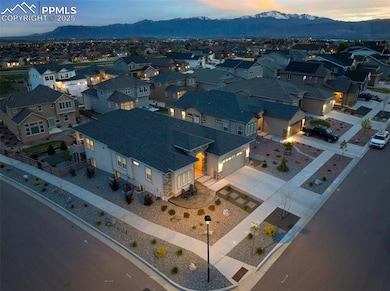 Aerial view of residential area with a mountainous background