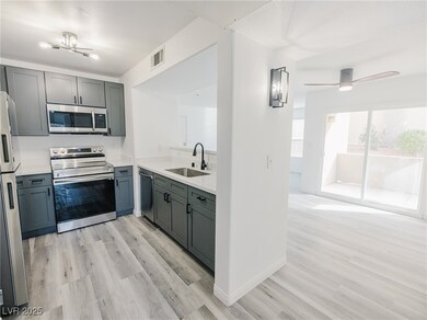 Kitchen with appliances with stainless steel finis