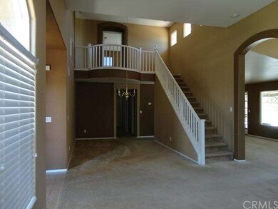 Entrance Formal Dining Room and Staircase