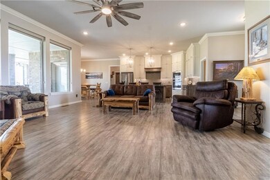 Living/great room looking into kitchen area.