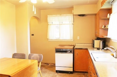 The kitchen carpeting has been removed. Look at th