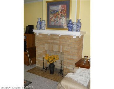 Living Room. Although fireplace does not function