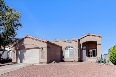 Mediterranean / spanish house with driveway, a gar