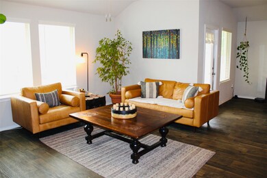 Spacious living area open to kitchen and dining room