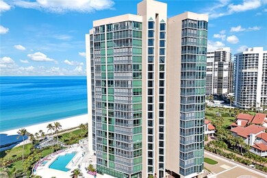 View of property featuring a view of the beach and