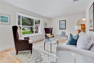 The formal living area has a beautiful bay window 