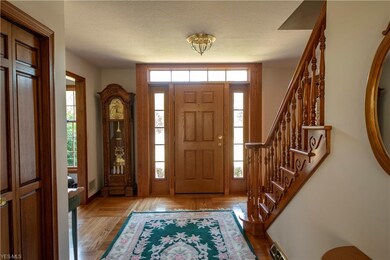 Doorway entrance, wood flooring.