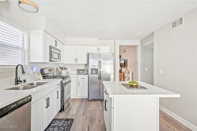 Kitchen with center island UPGRADED quartz visible