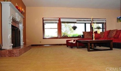 Large family room with lots of windows