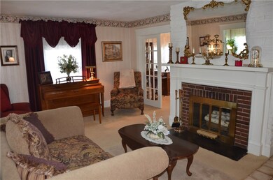 The gracious living room is the central hub of the
