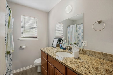 Bathroom featuring hardwood / wood-style flooring,