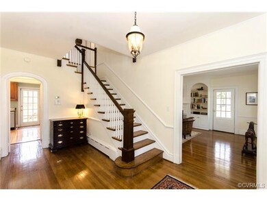 Foyer with staircase.  Views to family room and ki