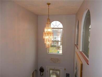 The chandelier in the foyer, stunning!