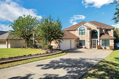Long Driveway to 3 car garage and front entry