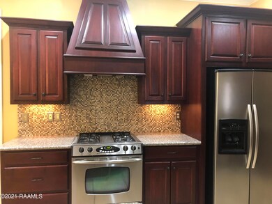 Gas Jacuzzi range and Cherry Cabinets
