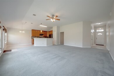 Spacious, open-plan living area with ample natural light.