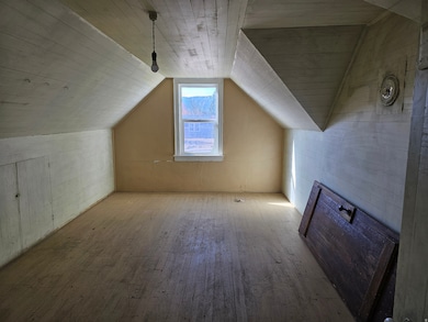 Bonus room with wood-type flooring, lofted ceiling, and wood ceiling