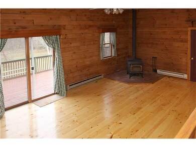 Living Room. Woodstove is perfect for cozy winter 