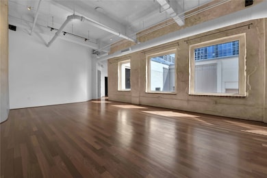 Main Living area showing exposed duct work, suppor