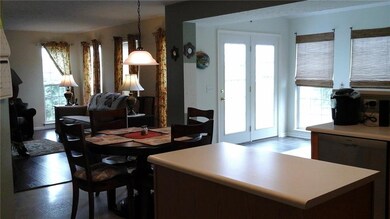 Large open kitchen with island, family room and al
