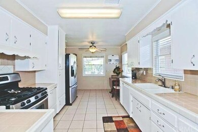 Galley style kitchen with views to citrus groves o