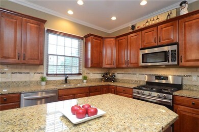 The beautiful granite counter tops are accented wi