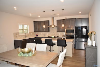 Kitchen, Breakfast and Family Rooms contribute to a Great Open Floor Plan.