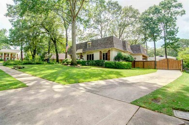 Long driveway with privacy gate creates your own o