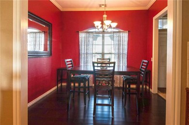 Beautiful dining room fits a large table with leaf