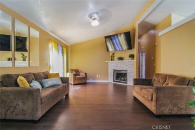 Lovely living room with newer flooring