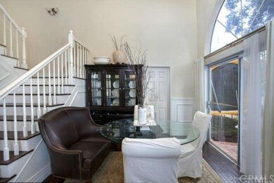 The Formal dining room has a slider to the side ya