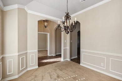 Unfurnished dining area featuring carpet flooring,