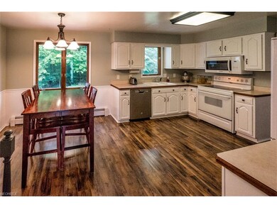 Beautiful updated kitchen equipped with range, mic