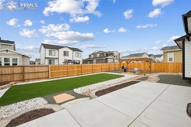 View of yard featuring a residential view and a patio area