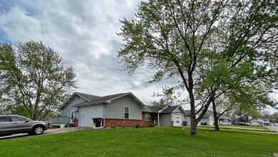 The duplex sits on a corner lot, providing an expa