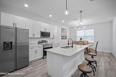 2297 Wagonwheel Ave SE, Palm Bay, FL 32909 - photo 7