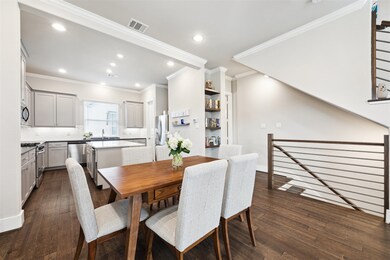 Coming up the stairs into the dining room and kitc
