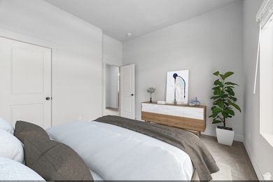 Bedroom with carpet flooring and baseboards