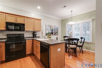 Bright eat-in kitchen with abundant cabinet storage