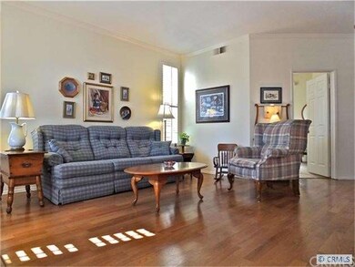 Gorgeous wood floors and sunny interior