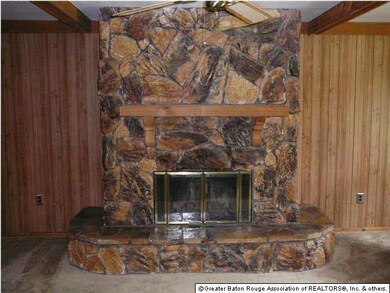 Stone Fireplace features are circulating fans and 