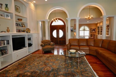 Dramatic columns and archways frame...