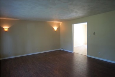 Enter the first floor great room, featuring bay wi